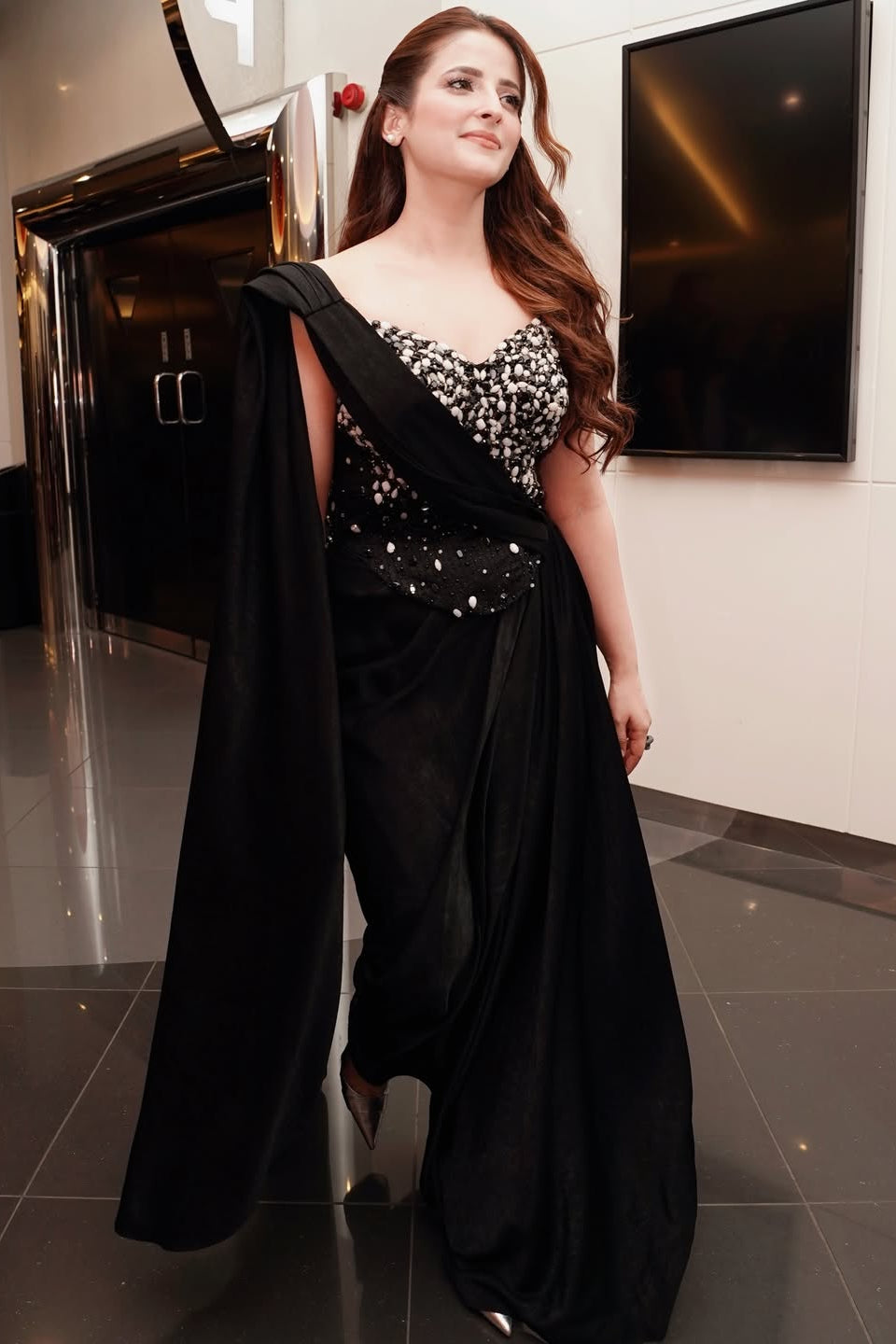 Rehmat Rattan in Black Crystal Embellished Cape Gown