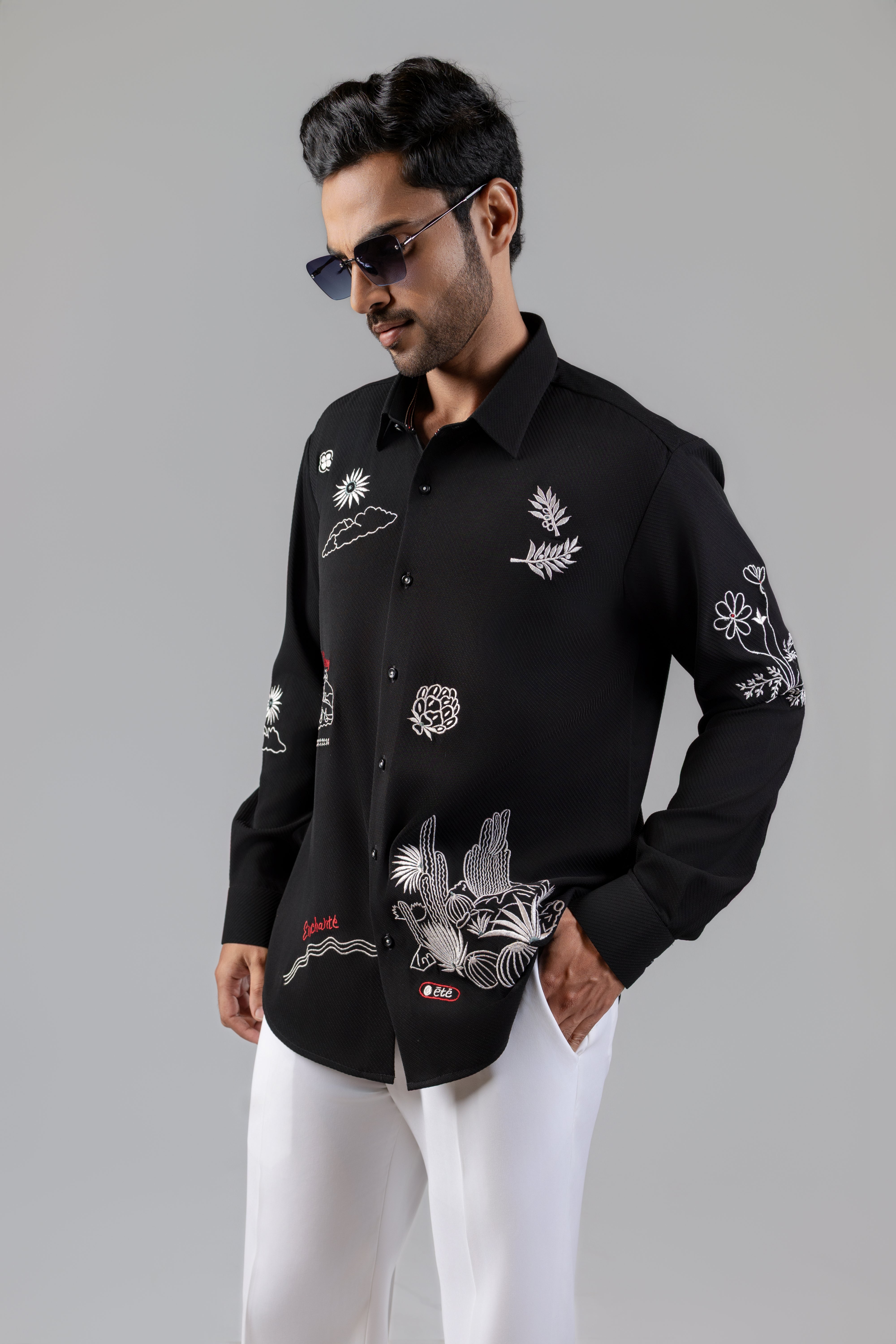 Black Shirt with Scattered White Embroidery and Red Script Detail