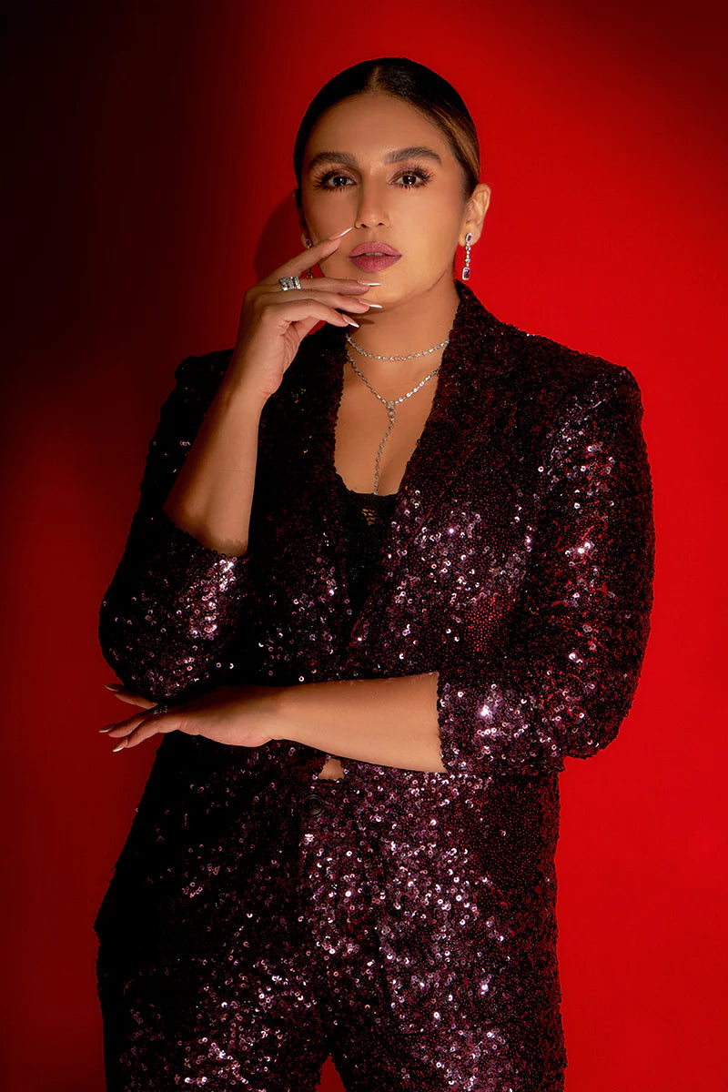 Huma Qureshi | The Crimson Queen in a Shimmering Pantsuit